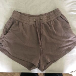 Dark wash pale purple shorts M